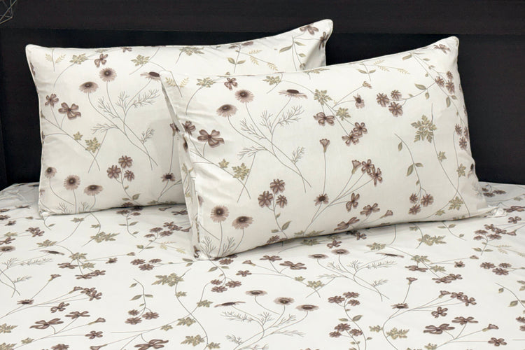 A custom bed sheet set, two cotton pillows with white and featuring a floral print 1.