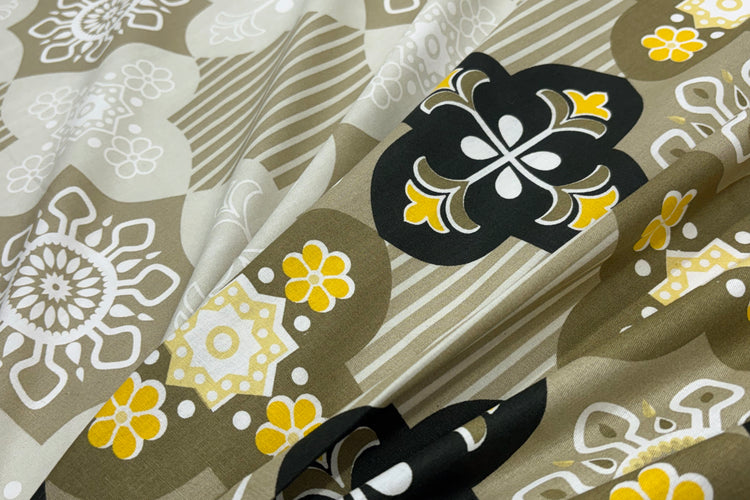 bed sheets with a green floral print pattern.