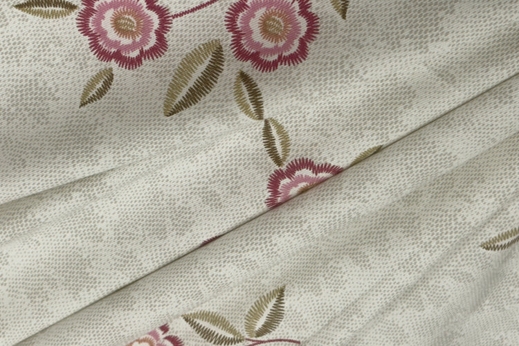 white bedsheet with printed floral.