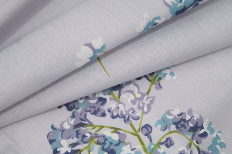 floral print design bedsheet in shades of purple with soft folding