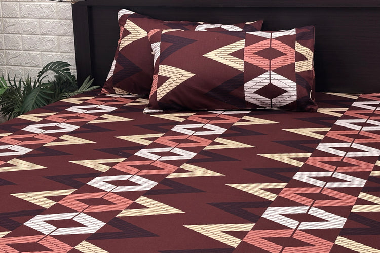 A custom bed sheet set in brown with geometric print, including a bedsheet and two pillowcases 1