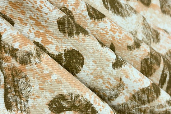bedsheet with a floral print in shades of brown .