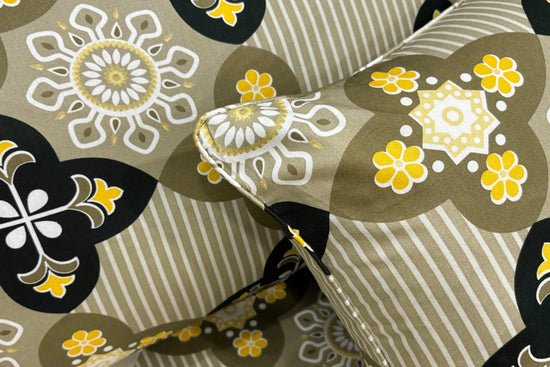 pillows with a green floral print pattern.